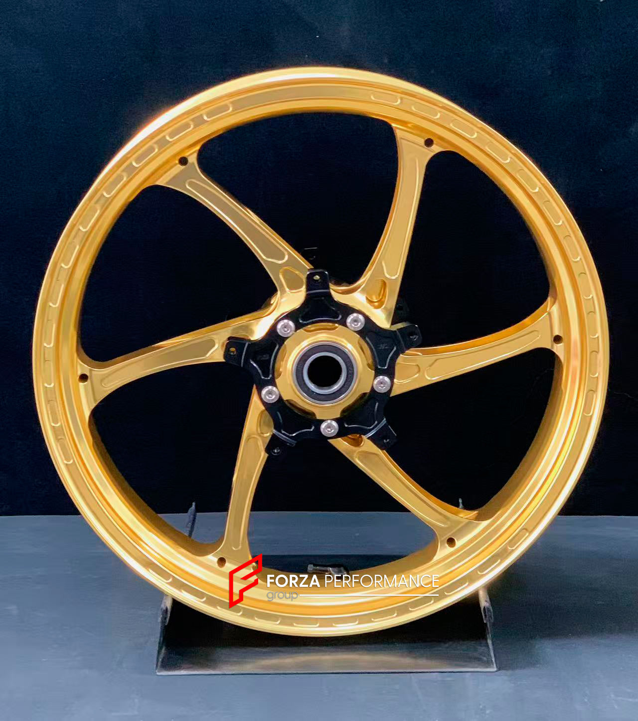 We manufacture premium quality forged motorcycle wheels rims for YAMAHA in any design, size, color.

Wheel sizes (motorcycle spec):

Front: 3.5 x 17

Rear: 6 x 17

Weight:

Front: 3.95 kg (8.7 lbs)

Rear: 4.9 kg (10.8 lbs)

Finishing: Gloss Gold

Forza Performance Group engineers and manufactures each forged motorcycle wheel individually per order. This ensures precise fitment, uncompromised strength, and unique styling. Whether for racing, touring, or daily use — our wheels are built for both performance a