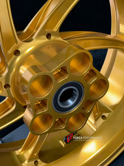 We manufacture premium quality forged motorcycle wheels rims for YAMAHA in any design, size, color.

Wheel sizes (motorcycle spec):

Front: 3.5 x 17

Rear: 6 x 17

Weight:

Front: 4.3 kg (9.48 lbs)

Rear 4.9 kg (10.8 lbs)


Finishing: Gloss Gold

Forza Performance Group engineers and manufactures each forged motorcycle wheel individually per order. This ensures precise fitment, uncompromised strength, and unique styling. Whether for racing, touring, or daily use — our wheels are built for both performance a