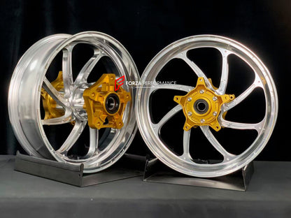 We manufacture premium quality forged motorcycle wheels rims for YAMAHA in any design, size, color.

Wheel sizes (motorcycle spec):

Front: 3.5 x 15

Rear: 4.5 x 15

Weight:

Front: 3.5 kg (7.72 lbs)

Rear: 4.75 kg (10.47 lbs)


Finishing: Gloss Silver

Forza Performance Group engineers and manufactures each forged motorcycle wheel individually per order. This ensures precise fitment, uncompromised strength, and unique styling. Whether for racing, touring, or daily use — our wheels are built for both perfor