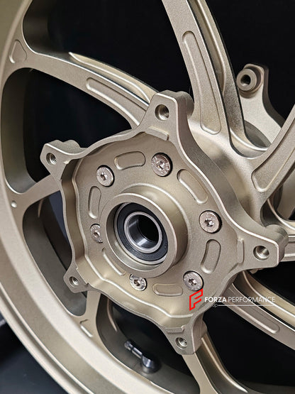 We manufacture premium quality forged motorcycle wheels rims for YAMAHA in any design, size, color.

Wheel sizes (motorcycle spec):

Front: 3.5 x 15

Rear: 4.5 x 15

Weight:

Front: 3.62 kg (7.98 lbs)

Rear: 4.8 kg (10.58 lbs)


Finishing: Satin Bronze

Forza Performance Group engineers and manufactures each forged motorcycle wheel individually per order. This ensures precise fitment, uncompromised strength, and unique styling. Whether for racing, touring, or daily use — our wheels are built for both perfor